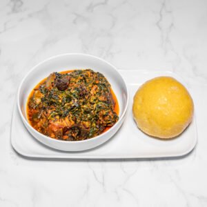 Garri with Edikaikong Soup garnised with Assorted Protein