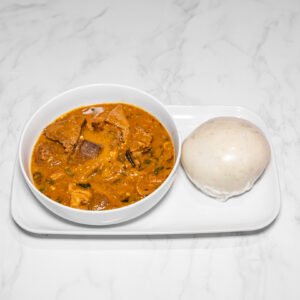 Semo with Ogbono Soup  garnised with Assorted Protein